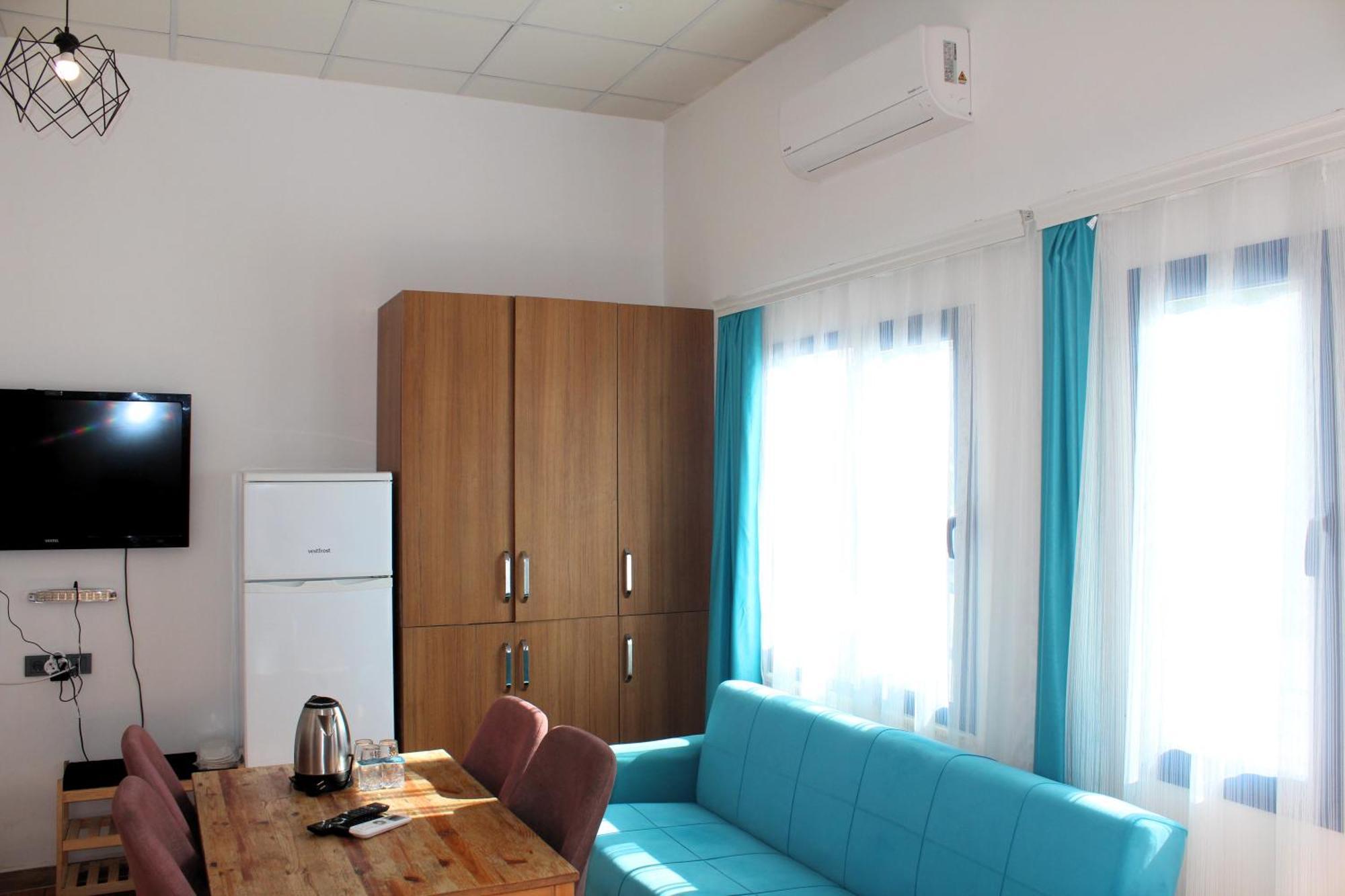 Mavi Pansiyon & Restaurant Дідім Номер фото