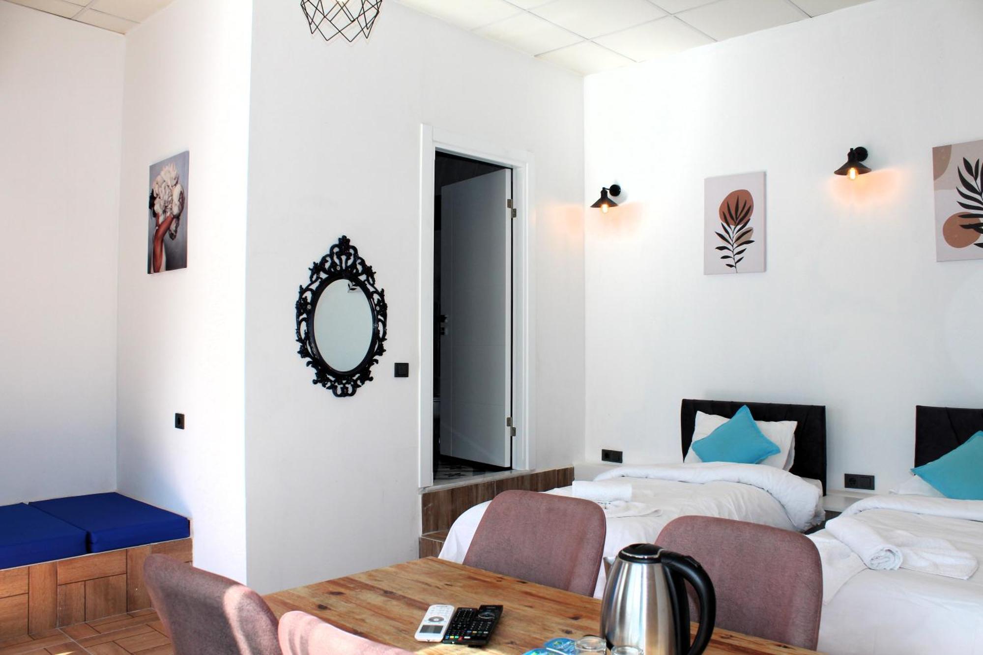 Mavi Pansiyon & Restaurant Дідім Номер фото