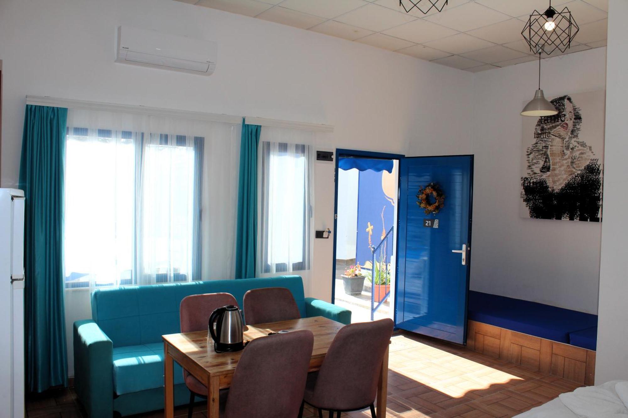 Mavi Pansiyon & Restaurant Дідім Номер фото