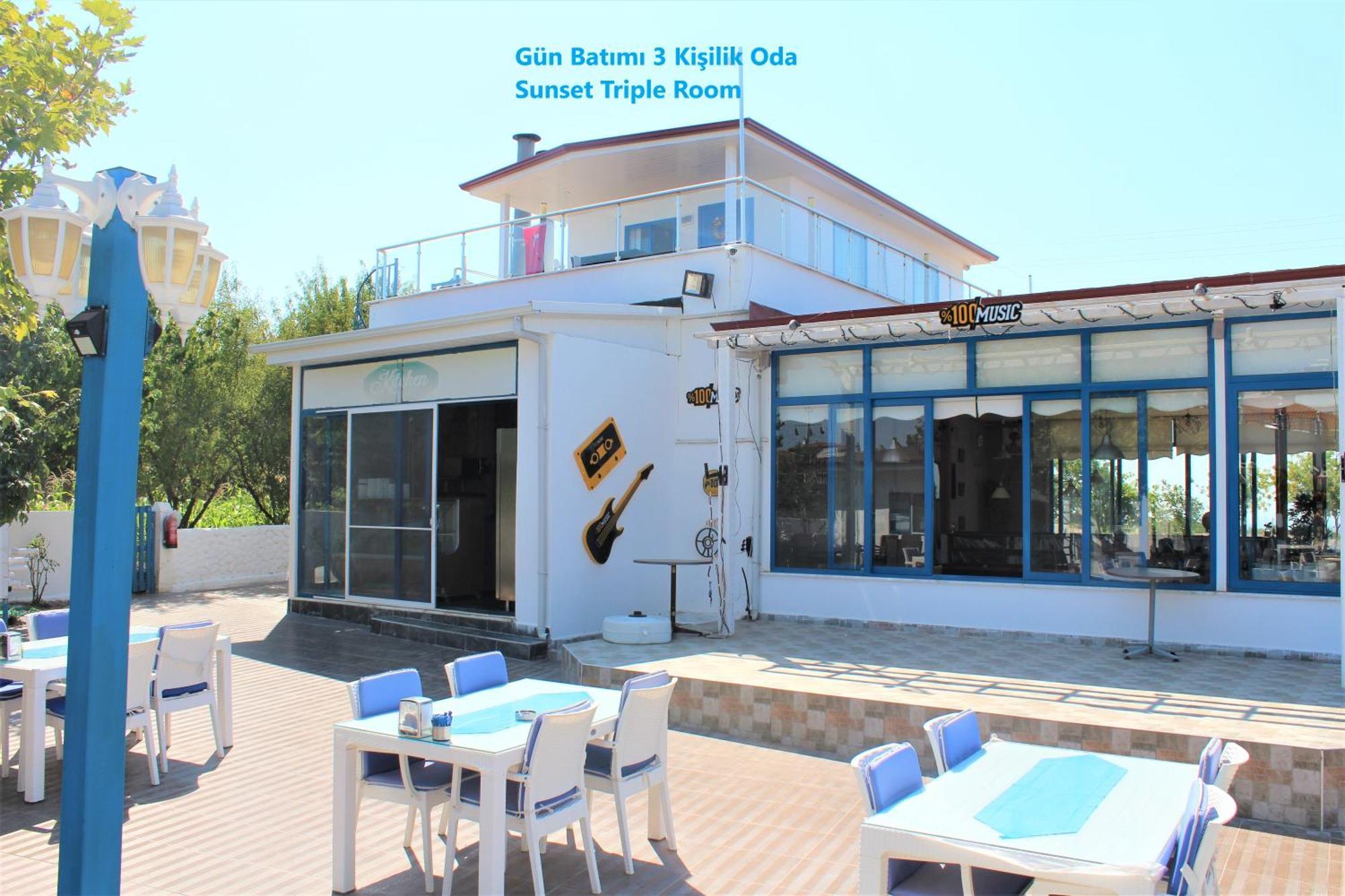 Mavi Pansiyon & Restaurant Дідім Номер фото